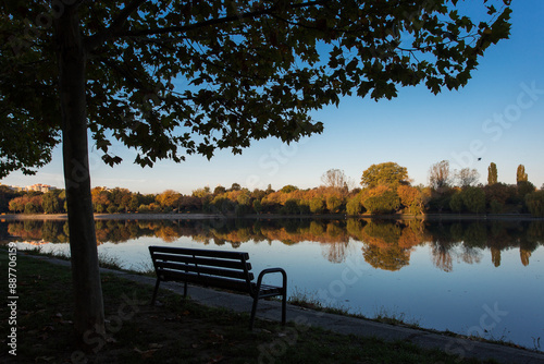 Obraz na płótnie Beautiful landscape in a park in autumn season with lake in background and colourful leafs w salonie
