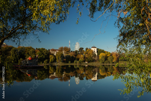 Obraz na płótnie Beautiful landscape in a park in autumn season with lake in background and colourful leafs w salonie