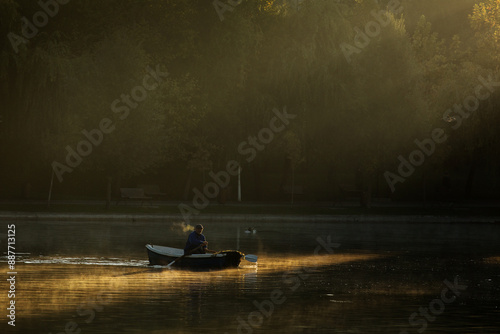 Obraz na płótnie Man with the boat on lake fishing w salonie