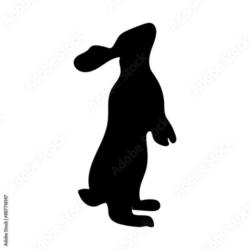 Vector silhouette of a rabbit. Animal fill with one spot. The rabbit stands on its hind legs. Easter bunny. Animal clipart.