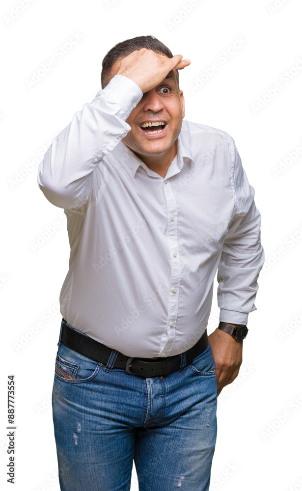 Fototapeta premium Middle age arab elegant man over isolated background very happy and smiling looking far away with hand over head. Searching concept.