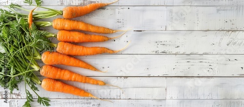 Fresh carrots arranged on a...