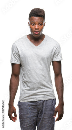 Young african american man over isolated background afraid and shocked with surprise expression, fear and excited face.