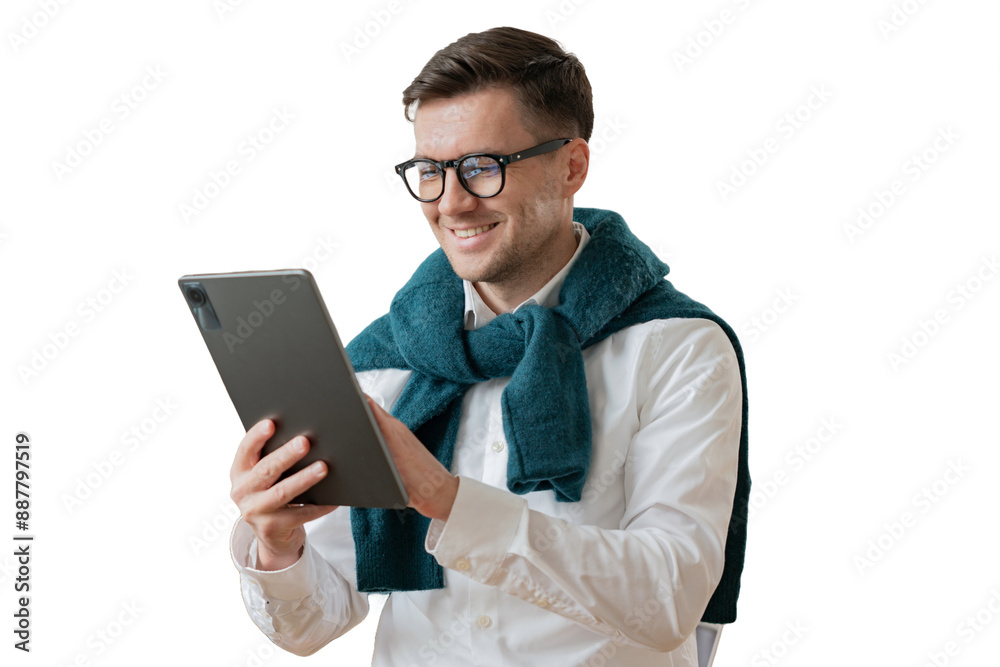 A positive male freelancer, a digital nomad, uses a tablet to work. cut out
A positive male freelancer, a digital nomad, uses a tablet to work. cut out