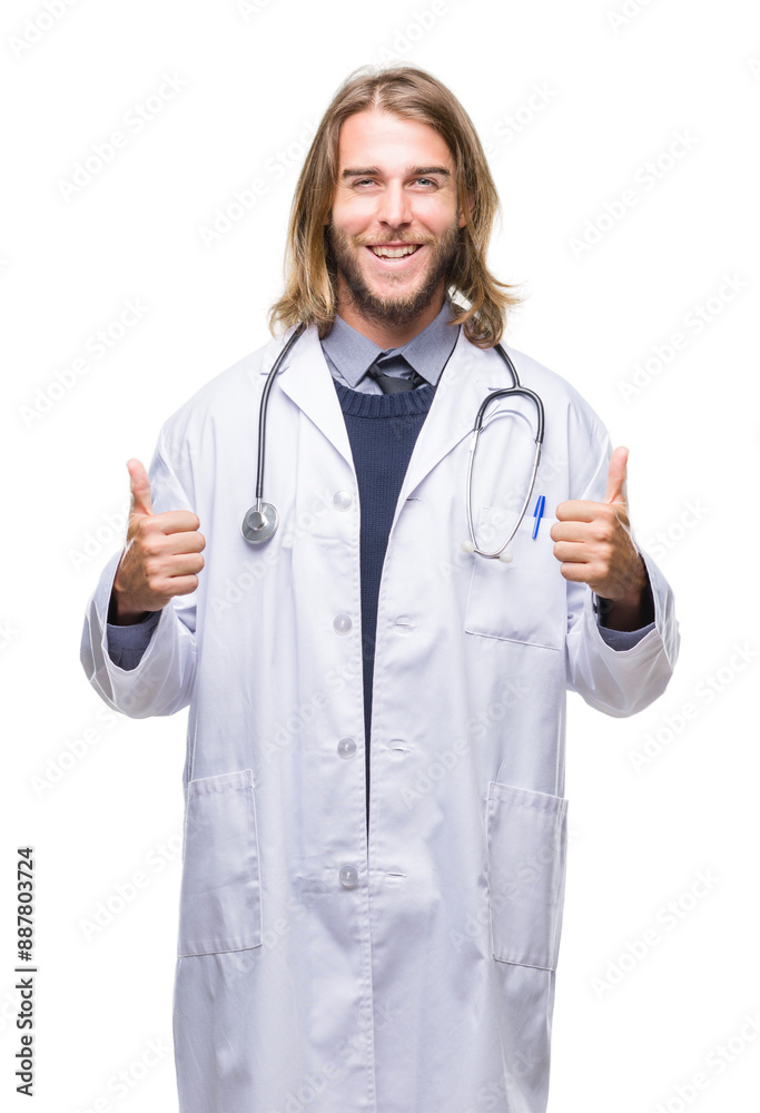 Young handsome doctor man with long hair over isolated background success sign doing positive gesture with hand, thumbs up smiling and happy. Looking at the camera with cheerful expression Young handsome doctor man with long hair over isolated background success sign doing positive gesture with hand, thumbs up smiling and happy. Looking at the camera with cheerful expression