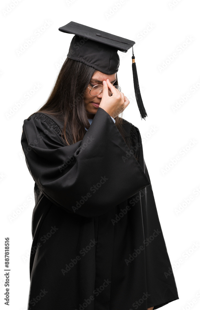 Young hispanic woman wearing graduated cap and uniform tired rubbing nose and eyes feeling fatigue and headache. Stress and frustration concept. Young hispanic woman wearing graduated cap and uniform tired rubbing nose and eyes feeling fatigue and headache. Stress and frustration concept.