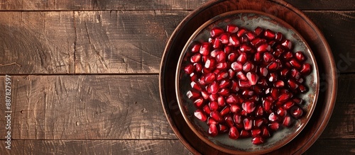 Pomegranate seeds on a plat...