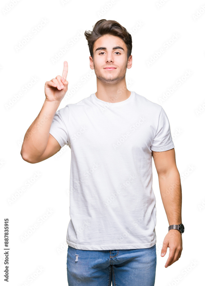 Young handsome man wearing white t-shirt over isolated background showing and pointing up with finger number one while smiling confident and happy. Young handsome man wearing white t-shirt over isolated background showing and pointing up with finger number one while smiling confident and happy.