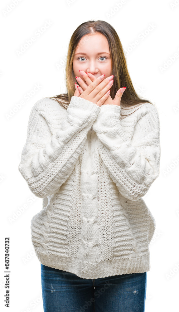Young beautiful caucasian woman wearing winter sweater over isolated background shocked covering mouth with hands for mistake. Secret concept. Young beautiful caucasian woman wearing winter sweater over isolated background shocked covering mouth with hands for mistake. Secret concept.