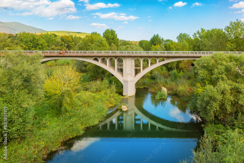 Bridge and its reflection in the water. Besalu, Girona, Catalonia, Spain. Famous landmark. Bridge and its reflection in the water. Besalu, Girona, Catalonia, Spain. Famous landmark.