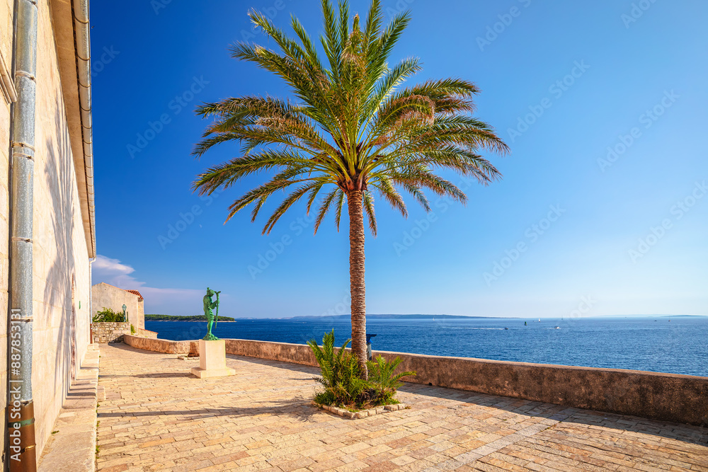 Obraz premium Town of Rab scenic stone street and sea coastline view