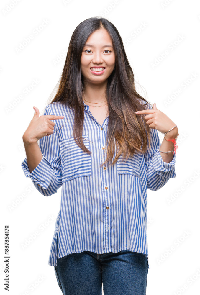 Young asian woman over isolated background looking confident with smile on face, pointing oneself with fingers proud and happy. Young asian woman over isolated background looking confident with smile on face, pointing oneself with fingers proud and happy.
