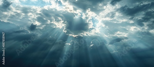 The sun shining through dar...