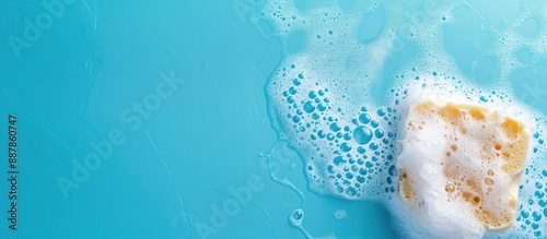 Cleaning sponge with soapy ...
