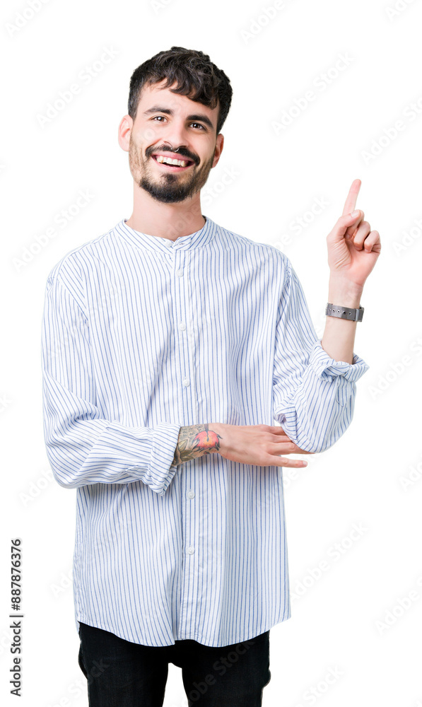 Young handsome business man over isolated background with a big smile on face, pointing with hand and finger to the side looking at the camera. Young handsome business man over isolated background with a big smile on face, pointing with hand and finger to the side looking at the camera.