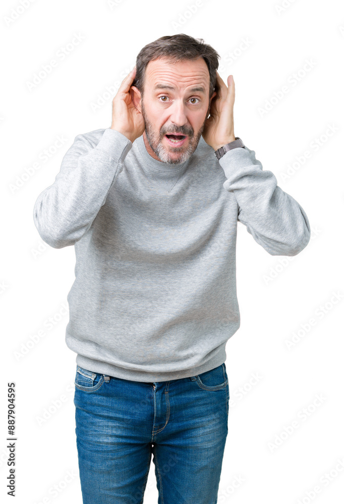 Handsome middle age senior man wearing a sweatshirt over isolated background Trying to hear both hands on ear gesture, curious for gossip. Hearing problem, deaf Handsome middle age senior man wearing a sweatshirt over isolated background Trying to hear both hands on ear gesture, curious for gossip. Hearing problem, deaf