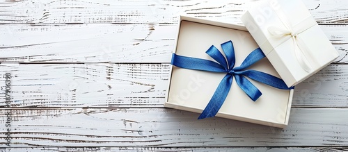 Gift box open on a white wo...