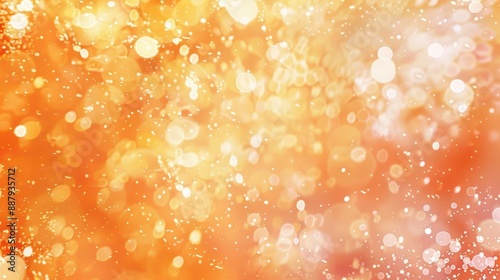 Abstract bokeh background with golden and orange hues, creating a festive and warm atmosphere, perfect for autumn-themed designs.