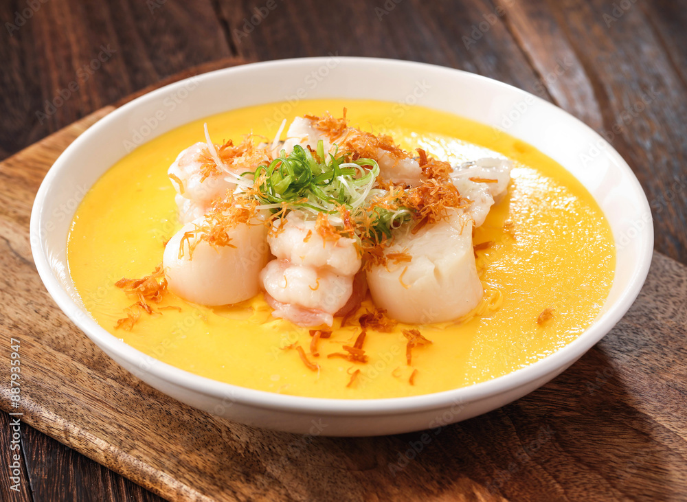 Steamed Egg with Seafood soup with shrimp paste served in dish isolated on background side view of hong kong food Steamed Egg with Seafood soup with shrimp paste served in dish isolated on background side view of hong kong food
