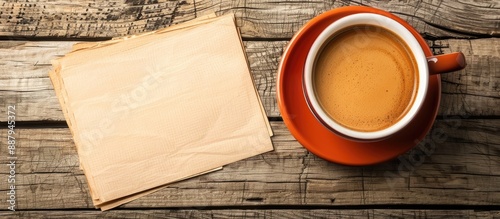 Top view of a blank paper note with a cup of coffee providing copy space image photo