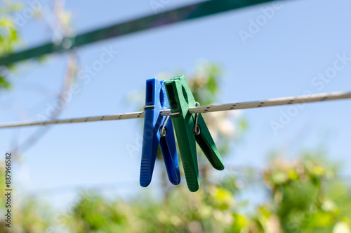 Clothespins and Clothes line on blur background