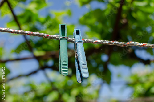 Clothespins and Clothes line on blur background