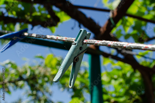Clothespins and Clothes line on blur background