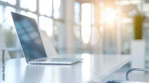 Serene Indoor Scene Featuring Laptop on White Desk photo