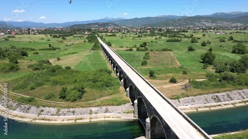 Aerial view of the historic Carev Bridge in the city of Niksic, Montenegro photo