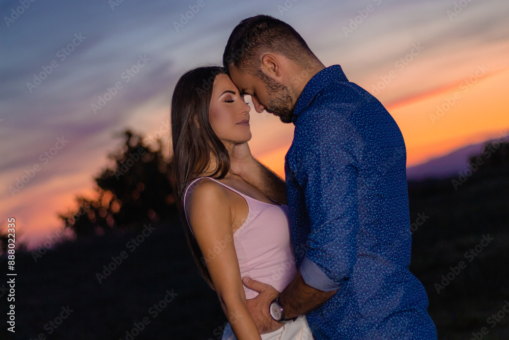 Romantic Couple Embracing During Sunset Romantic Couple Embracing During Sunset