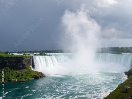 Canadian side view of Niagara Falls, Foamy Misty Streams of Horseshoe Falls in a Grey Dusky Day