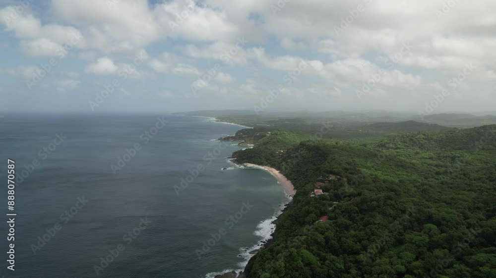Aerial view of Iguana, Nicaragua. Mountains with pacific ocean in background. Drone view Aerial view of Iguana, Nicaragua. Mountains with pacific ocean in background. Drone view