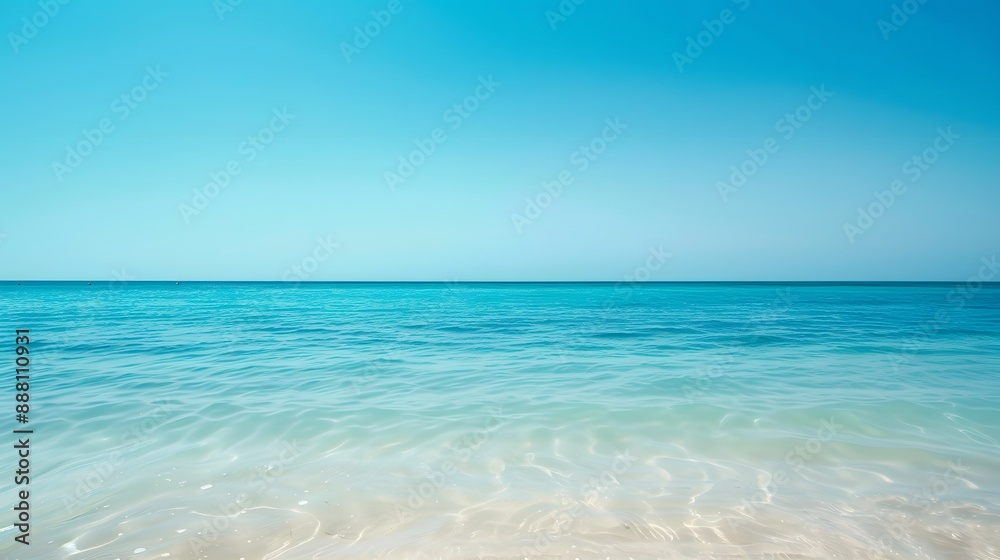 Tranquil Aquamarine Ocean Water and Clear Blue Sky Tranquil Aquamarine Ocean Water and Clear Blue Sky