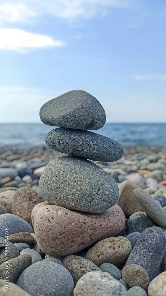 Balance pebble stones on the beach near the sea Balance pebble stones on the beach near the sea