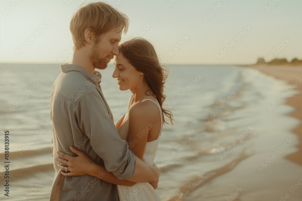 Romantic couple embracing on a beach at sunset, love concept Romantic couple embracing on a beach at sunset, love concept