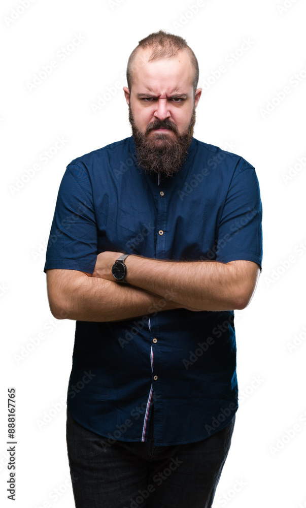 Young caucasian hipster man over isolated background skeptic and nervous, disapproving expression on face with crossed arms. Negative person. Young caucasian hipster man over isolated background skeptic and nervous, disapproving expression on face with crossed arms. Negative person.