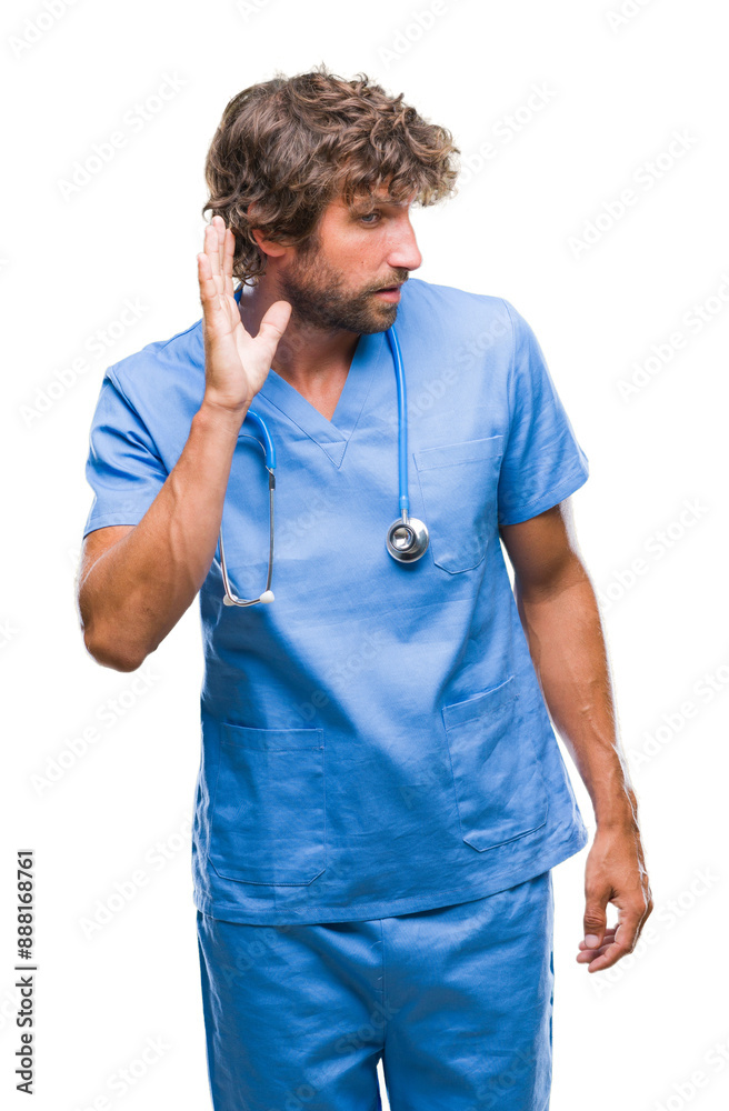 Handsome hispanic surgeon doctor man over isolated background smiling with hand over ear listening an hearing to rumor or gossip. Deafness concept. Handsome hispanic surgeon doctor man over isolated background smiling with hand over ear listening an hearing to rumor or gossip. Deafness concept.