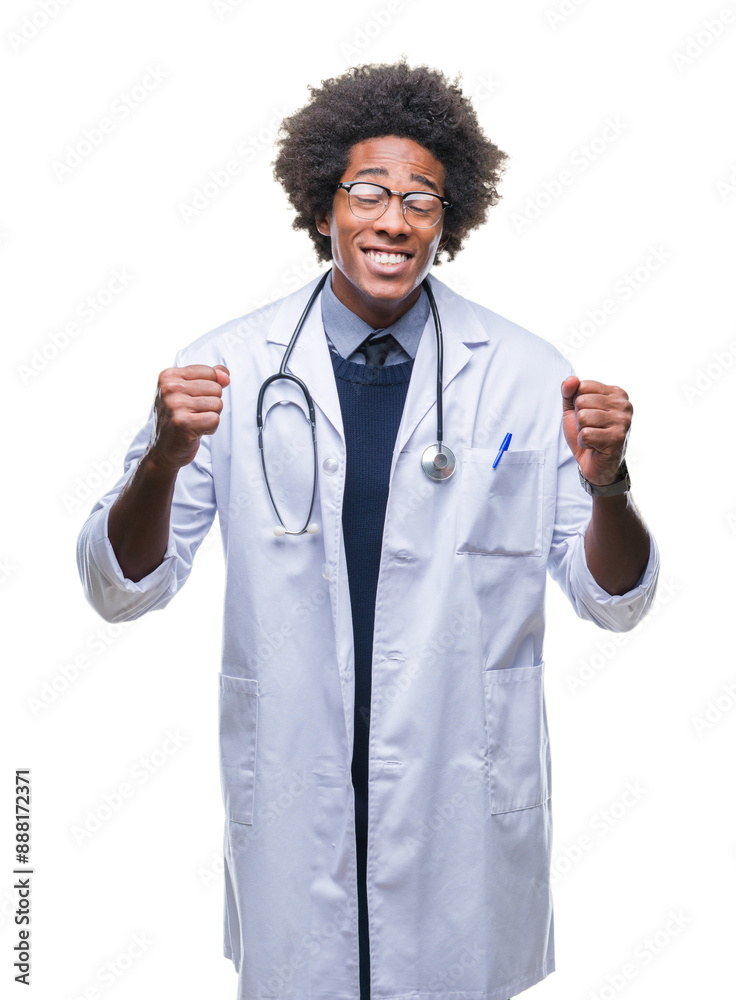 Afro american doctor man over isolated background excited for success with arms raised celebrating victory smiling. Winner concept. Afro american doctor man over isolated background excited for success with arms raised celebrating victory smiling. Winner concept.