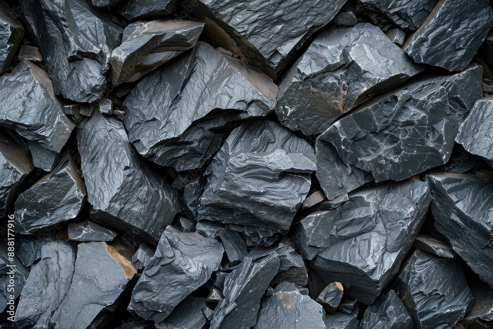 Texture background of rough black and gray stone with a grainy surface Texture background of rough black and gray stone with a grainy surface