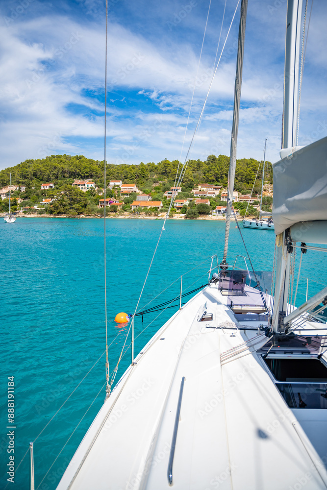 Fototapeta premium Yacht sailing near Croatia coast. Close-up view of the deck, mast and sails. Yachting concept