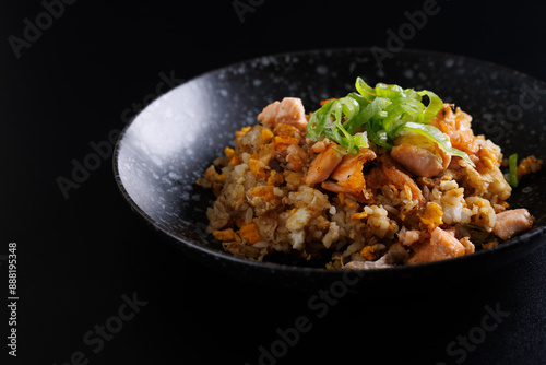 Japanese fried rice yakimeshi isolated in black background
