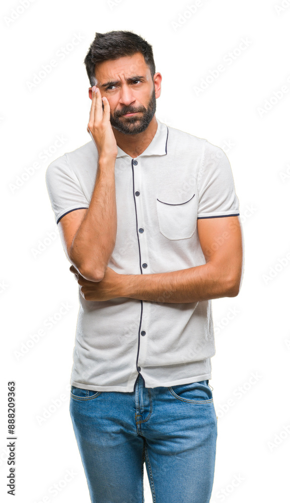 Fototapeta premium Adult hispanic man over isolated background thinking looking tired and bored with depression problems with crossed arms.