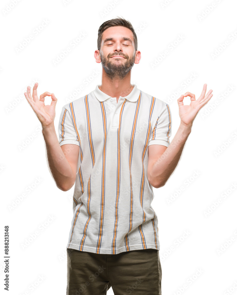 Young handsome man over isolated background relax and smiling with eyes closed doing meditation gesture with fingers. Yoga concept. Young handsome man over isolated background relax and smiling with eyes closed doing meditation gesture with fingers. Yoga concept.