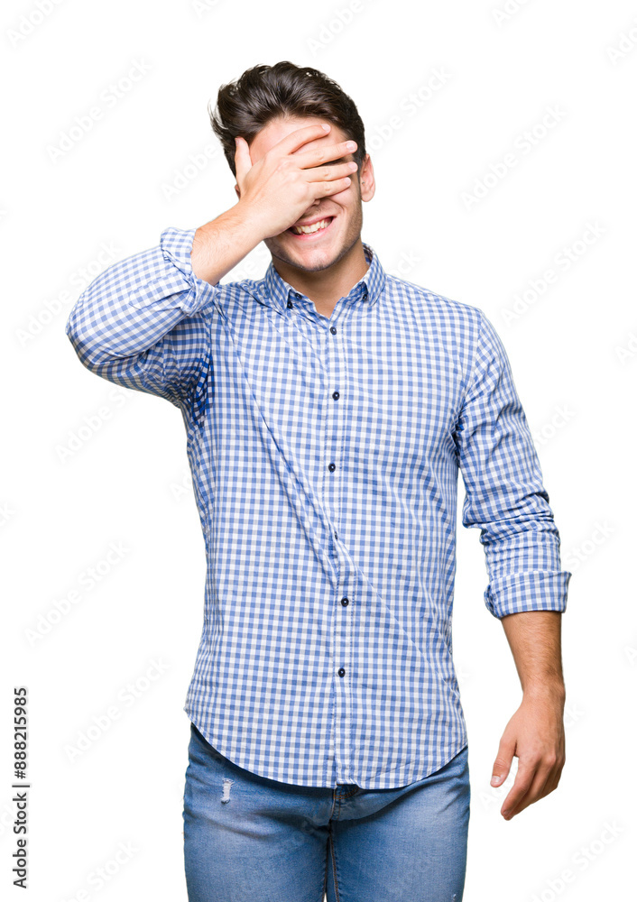 Young handsome business man over isolated background smiling and laughing with hand on face covering eyes for surprise. Blind concept. Young handsome business man over isolated background smiling and laughing with hand on face covering eyes for surprise. Blind concept.