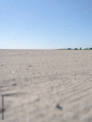 Empty closeup of sand at Short Beach in Stratford Connecticut during the day. 