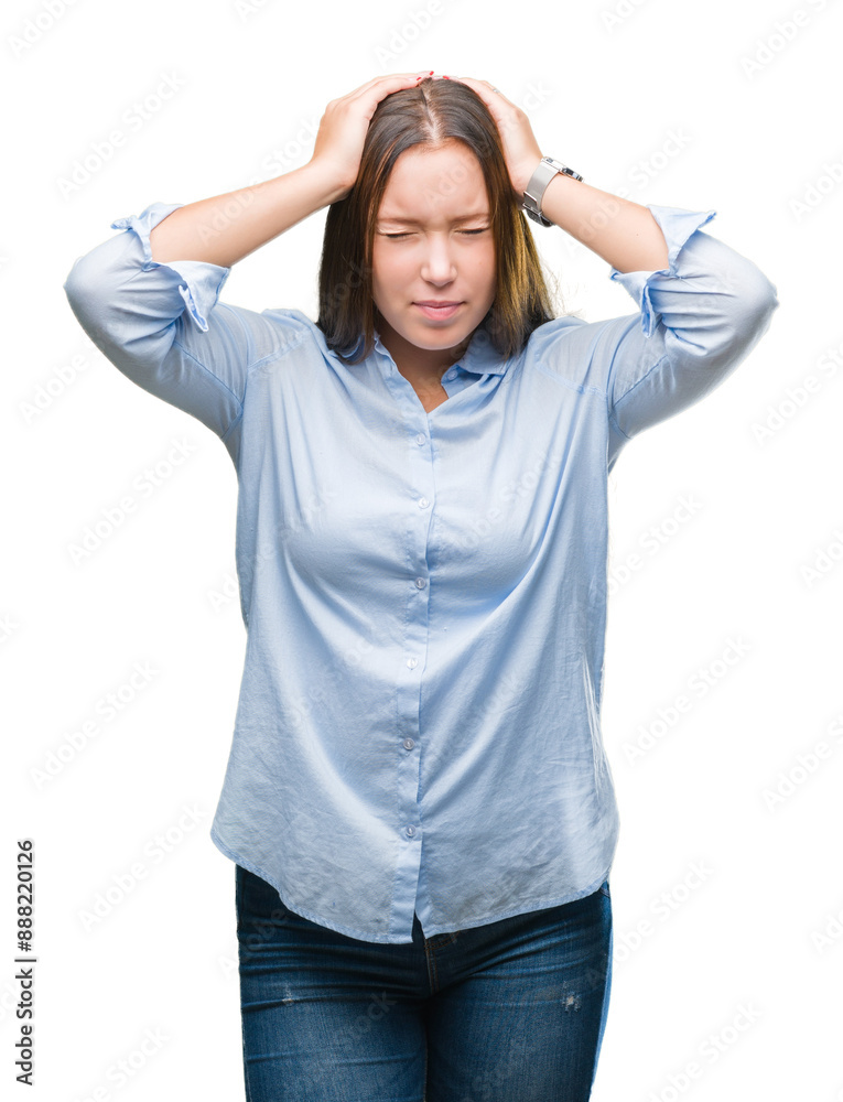 Young caucasian beautiful woman over isolated background suffering from headache desperate and stressed because pain and migraine. Hands on head. Young caucasian beautiful woman over isolated background suffering from headache desperate and stressed because pain and migraine. Hands on head.