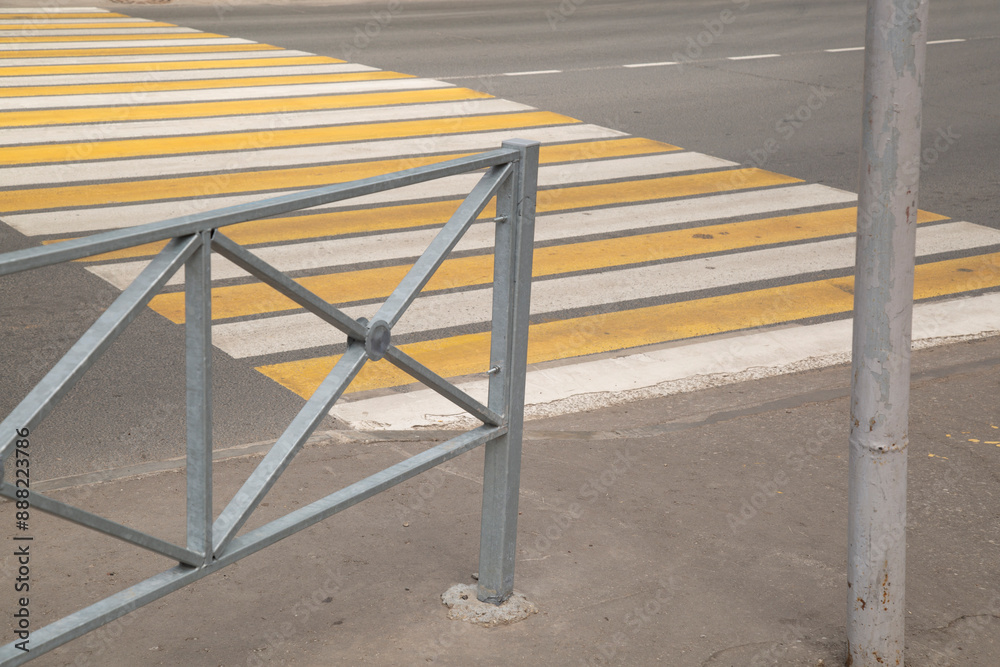 A pedestrian crossing in a big city.Transport and pedestrians. A pedestrian crossing in a big city.Transport and pedestrians.