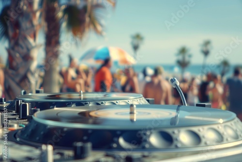 DJ playing modern music at spring break beach party with blurred background photo