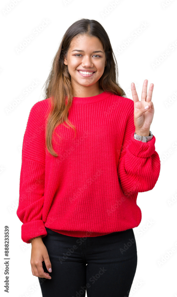 Young beautiful brunette woman wearing red winter sweater over isolated background showing and pointing up with fingers number three while smiling confident and happy. Young beautiful brunette woman wearing red winter sweater over isolated background showing and pointing up with fingers number three while smiling confident and happy.