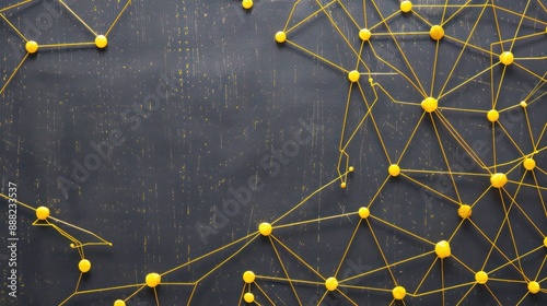 Lemon yellow dots connected by golden threads on a charcoal grey canvas, text space in the upper right